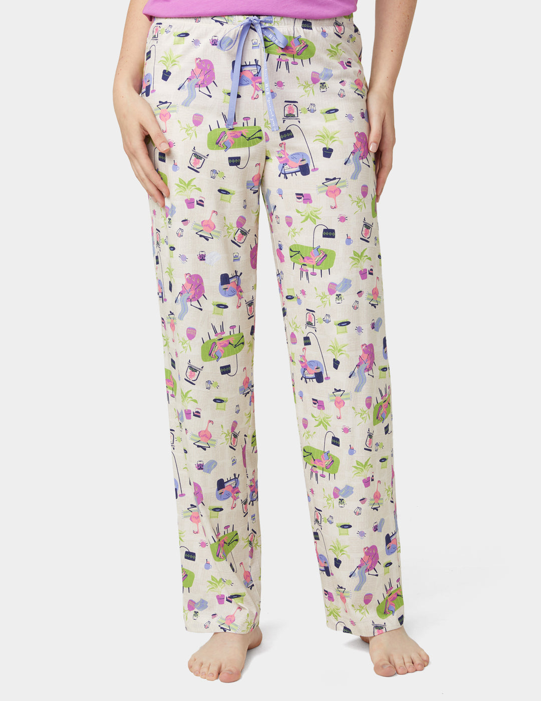 Patterned pajama pants worn by a person on a white background