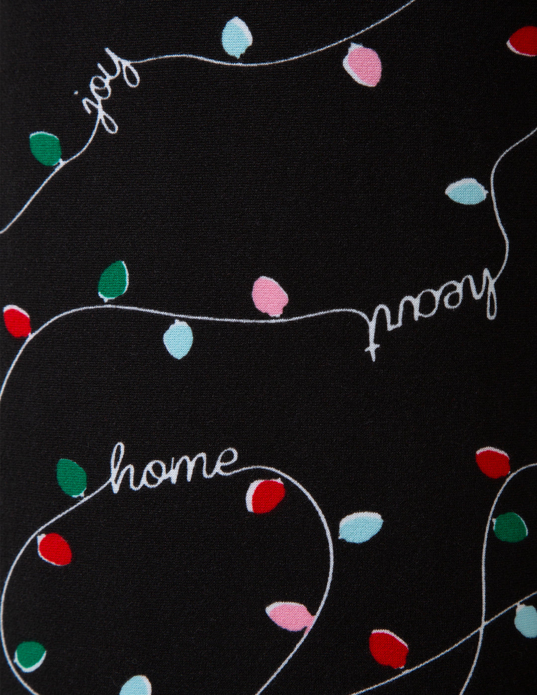 Decorative design with Christmas lights and the word 'home' on a black background