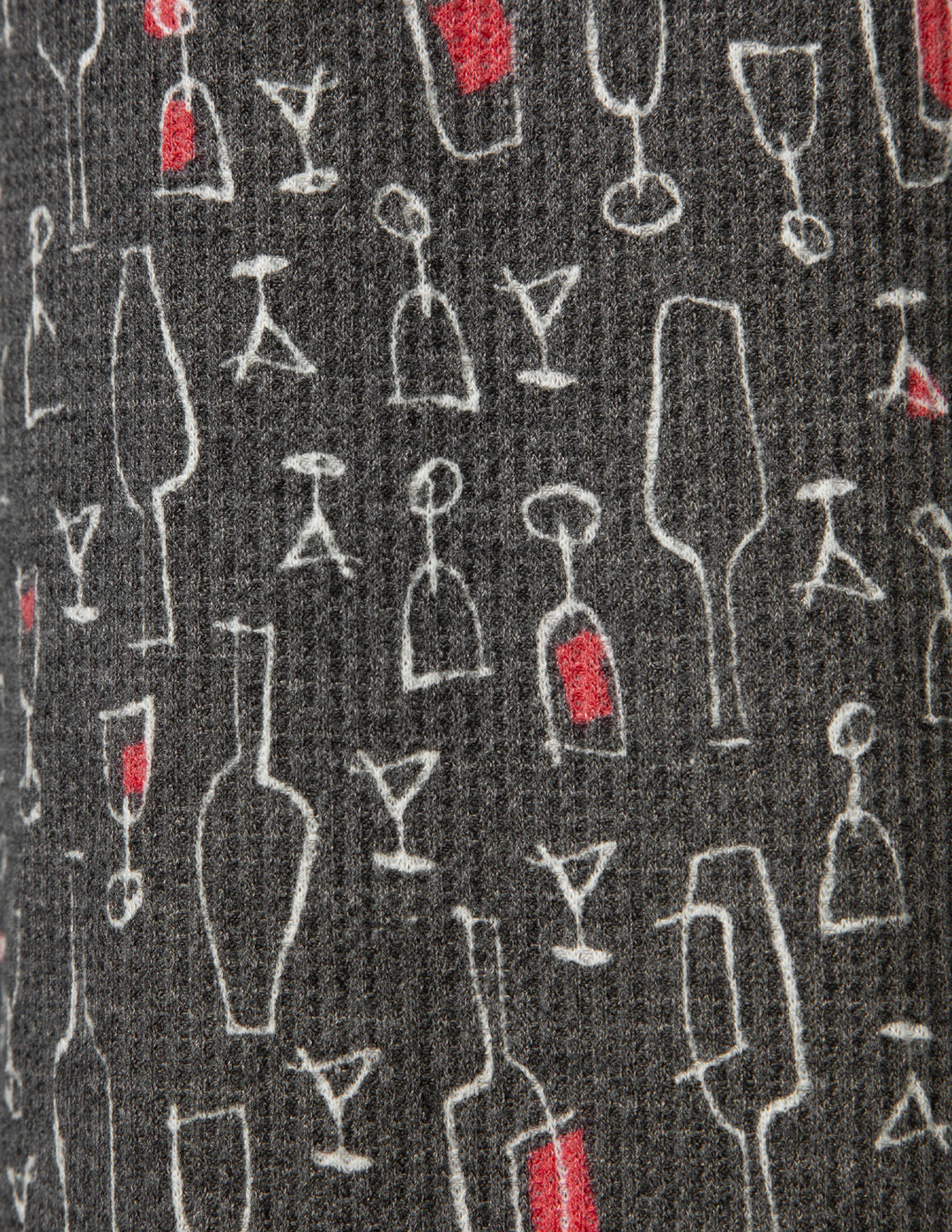 Pattern of wine glasses and bottles on a black background