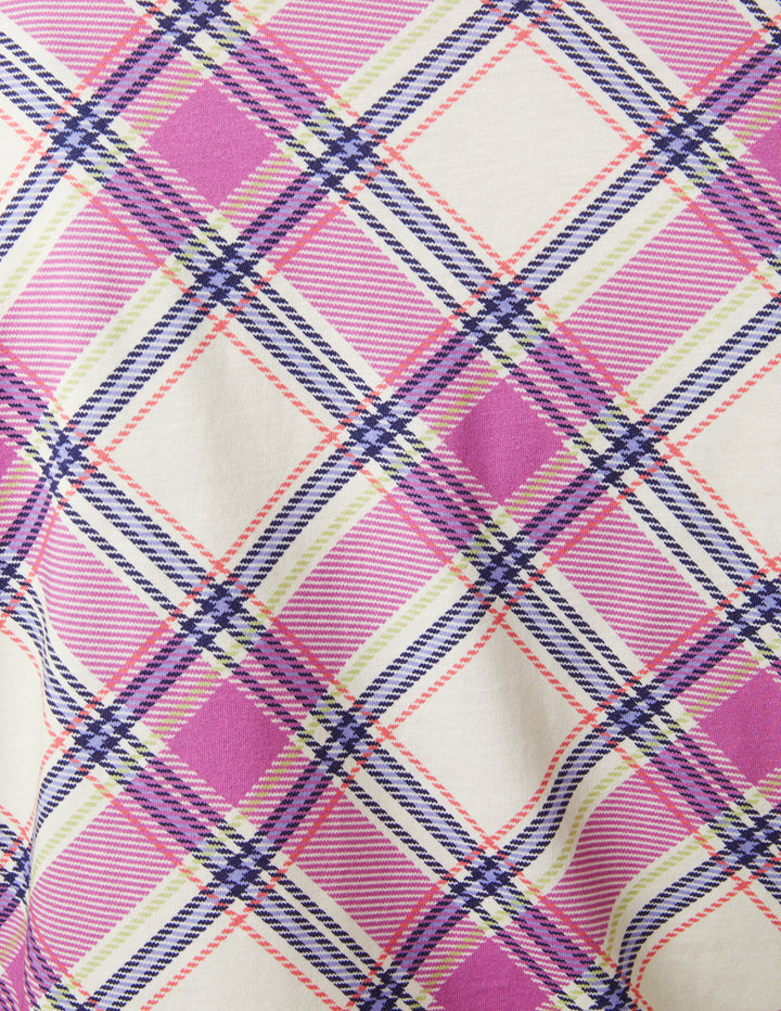 Close-up of a fabric with pink and purple plaid pattern