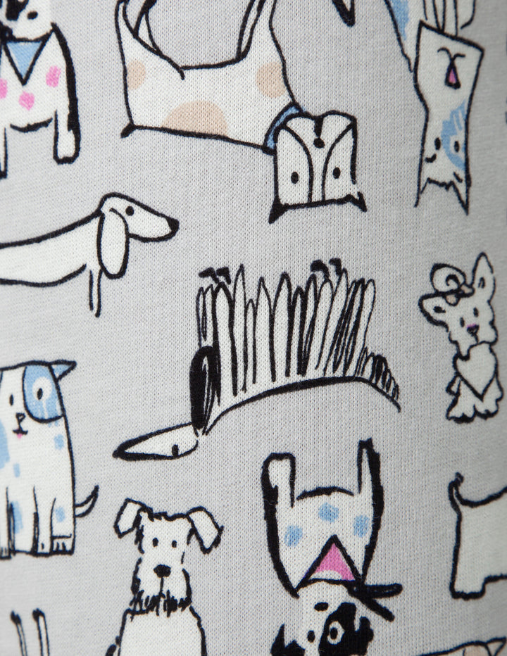 Pattern of cartoon dogs and houses on a light gray background