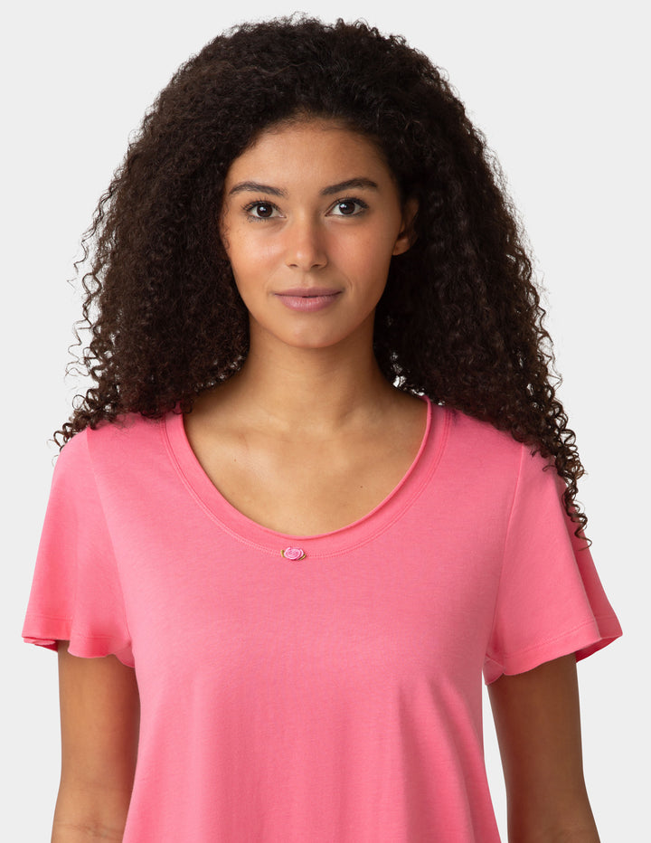Woman wearing pink pajama shirt