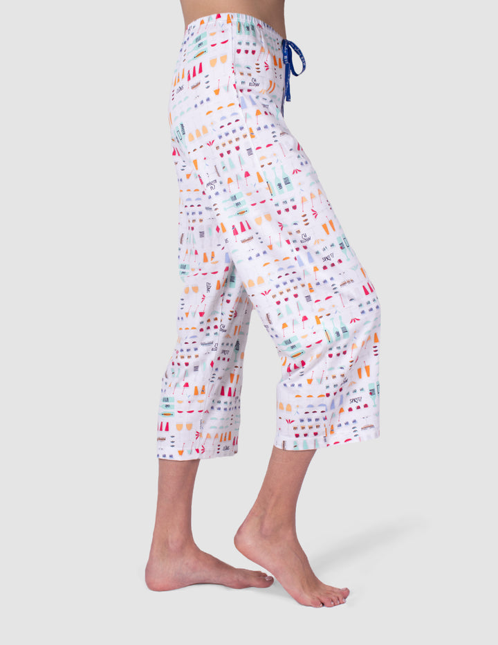 Capri pajama pants with colorful pattern on a white background side view