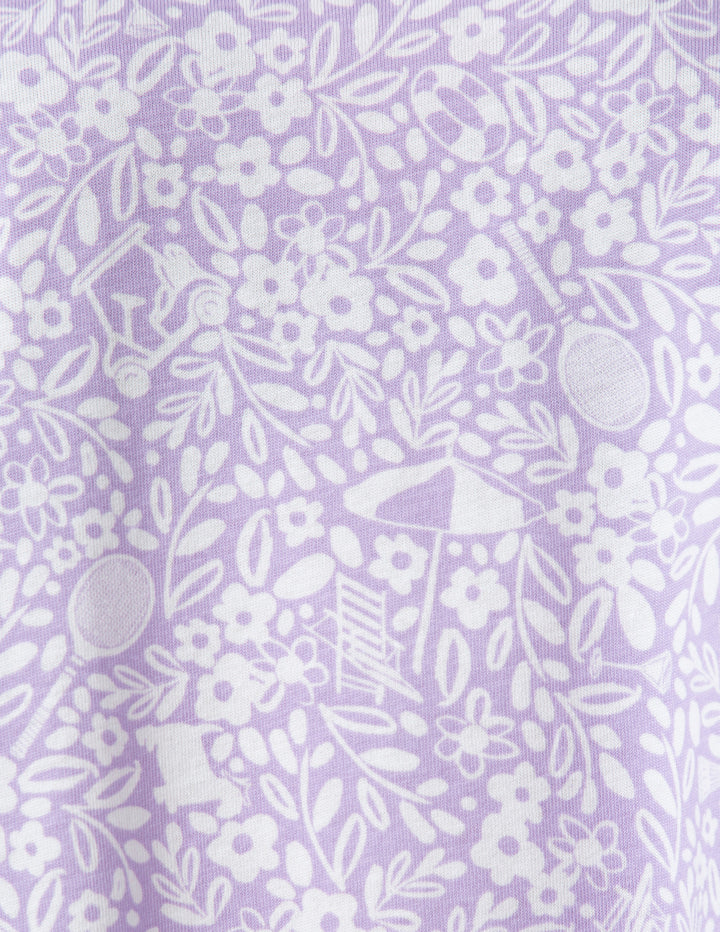 White floral and outdoorsy doodles on a purple background