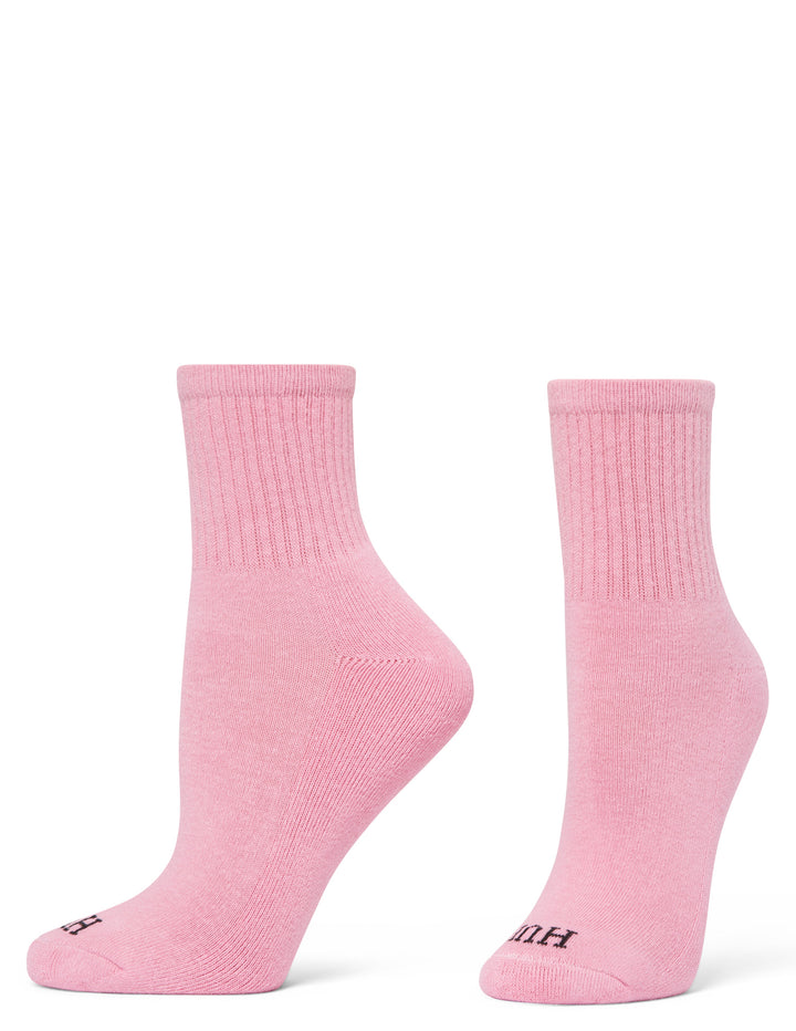 Pair of pink socks on a white background