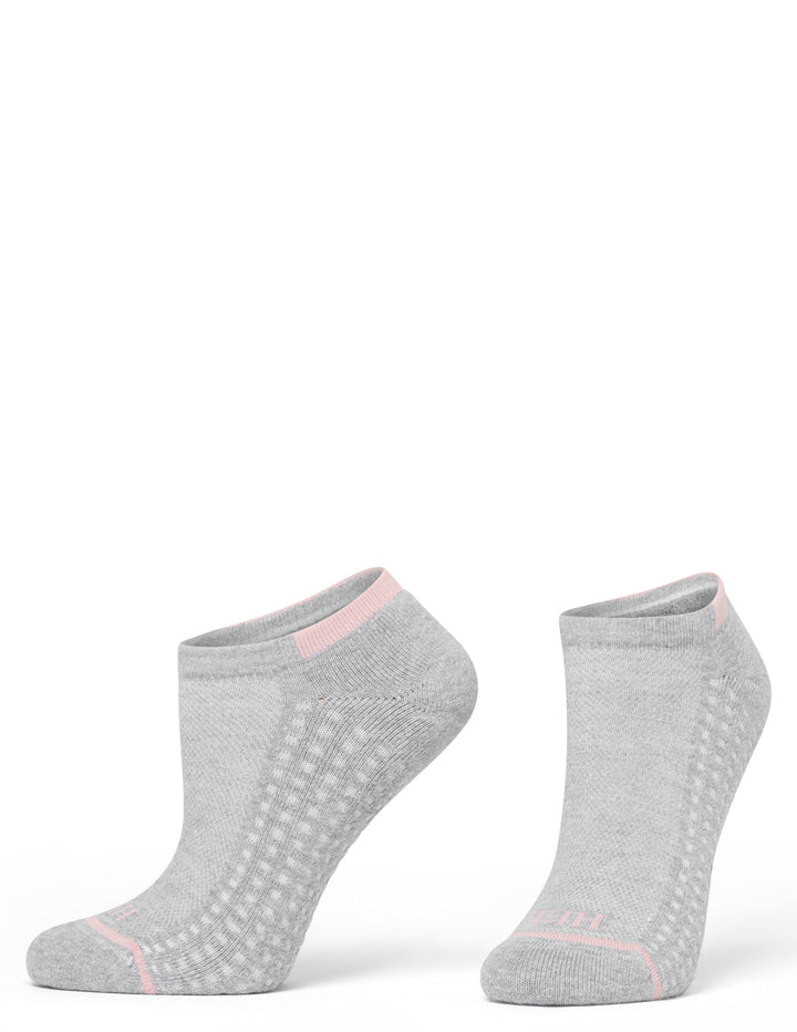 Pair of gray ankle socks with pink accents on a white background