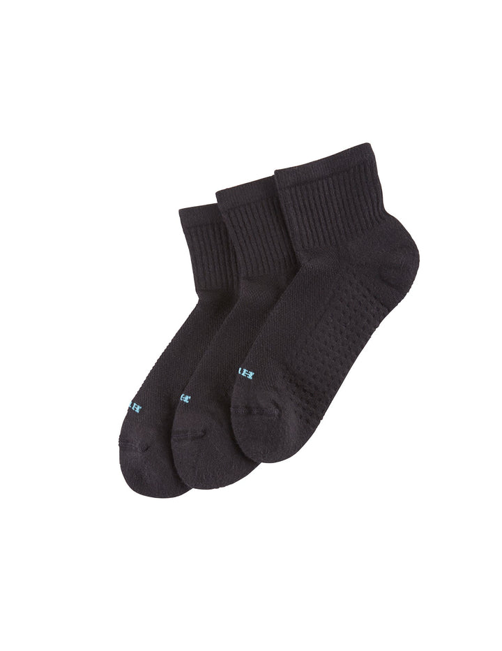 Three black mini crew socks display on a clean white background.