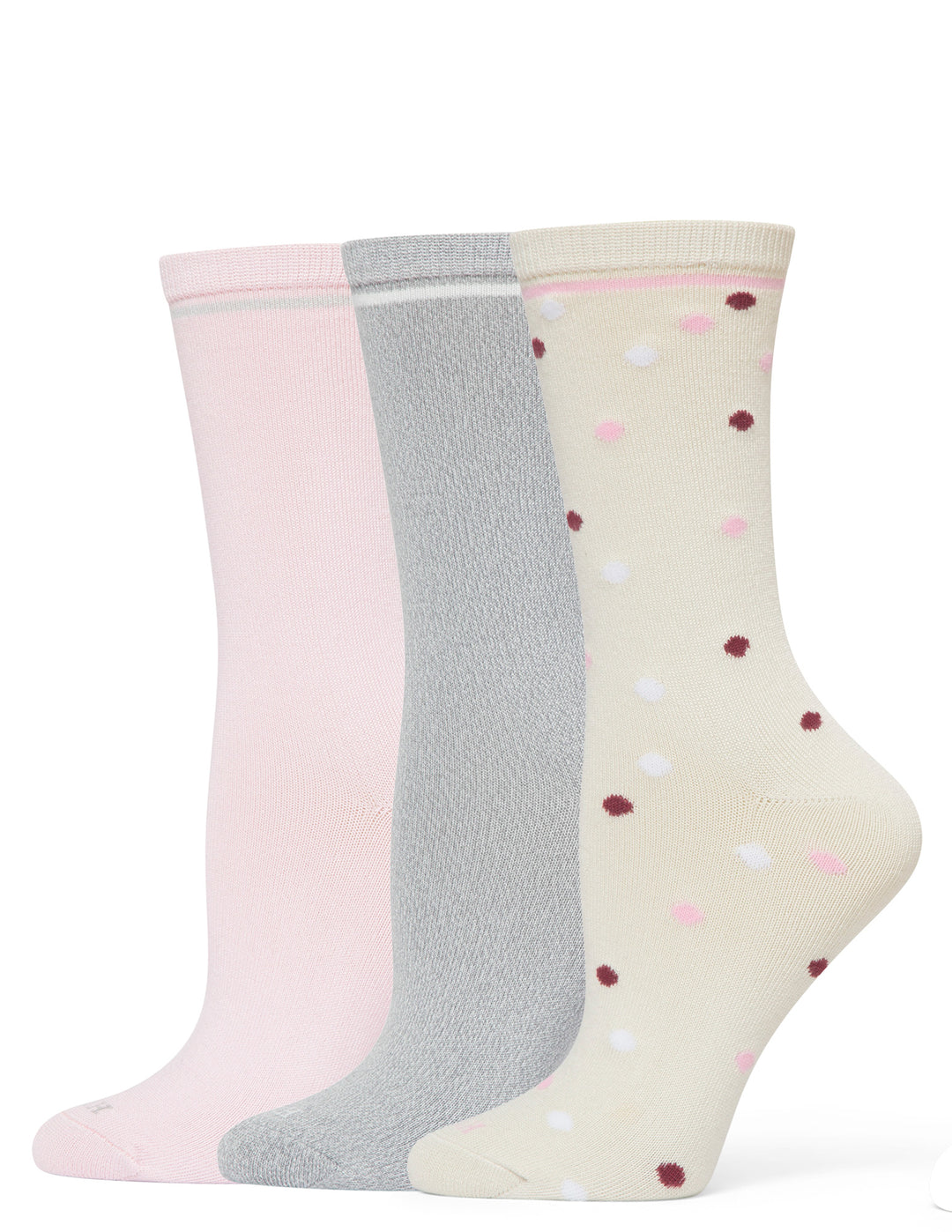 Three pairs of socks in pink, gray, and cream with polka dots on a white background