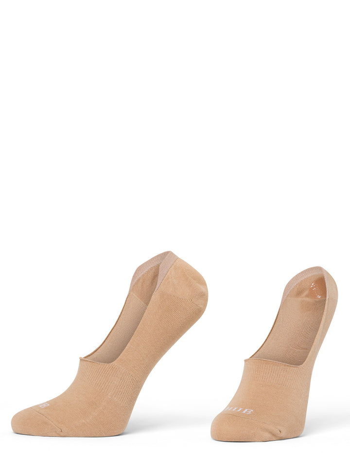 Two beige no-show socks on a white background