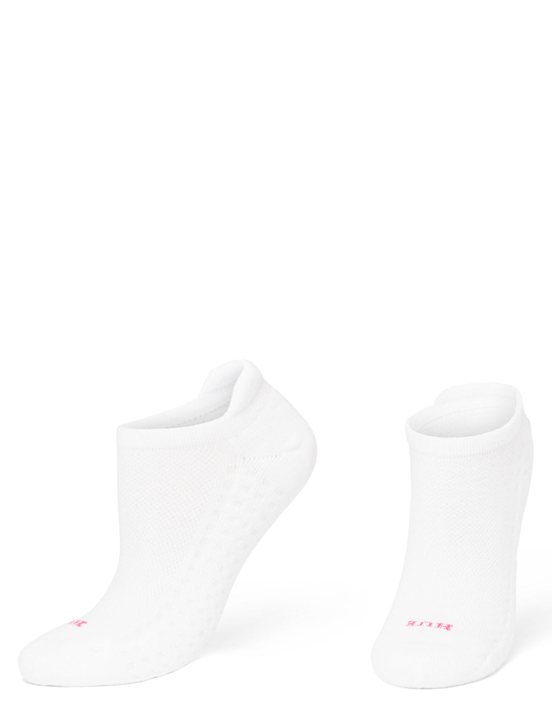 A pair of white low-cut ankle socks with a textured grip pattern on the sole and a small pink logo on the toe, displayed against a solid white background.