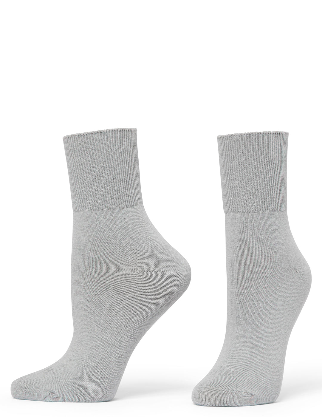 Pair of gray socks on a white background