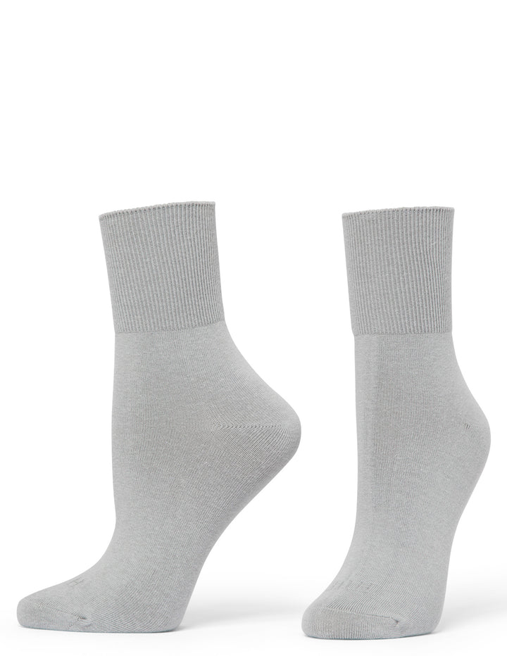 Pair of gray socks on a white background