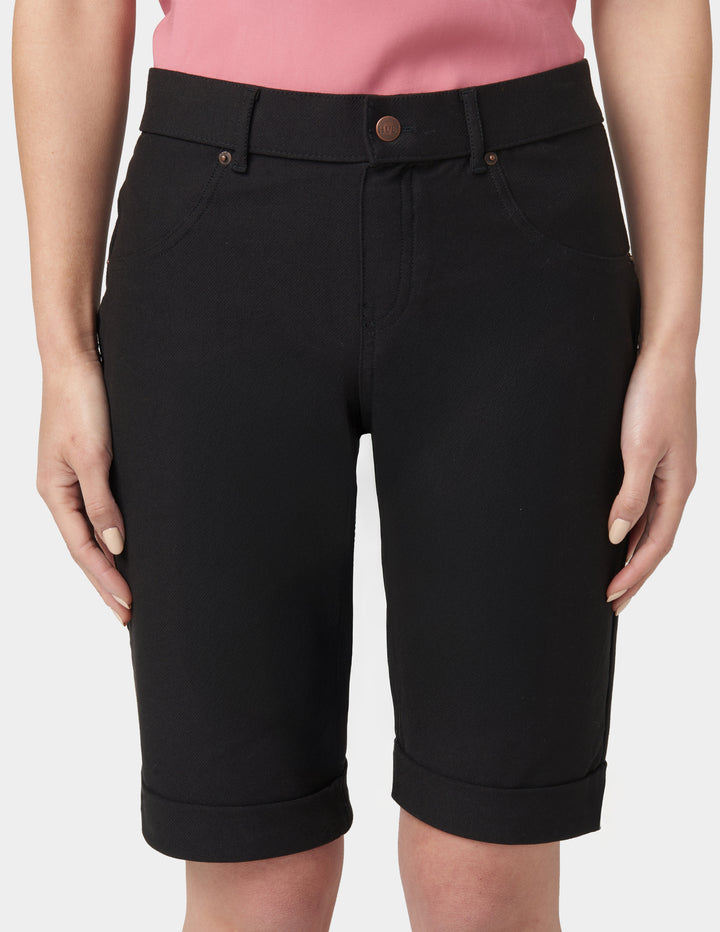 Black shorts worn by a person on a white background