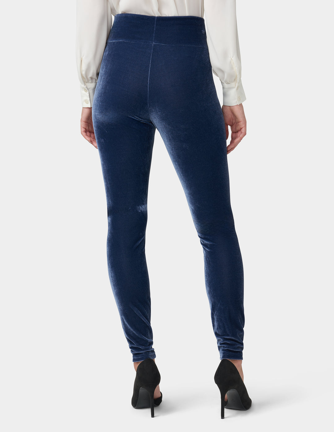 Woman wearing Peacoat velvet leggings