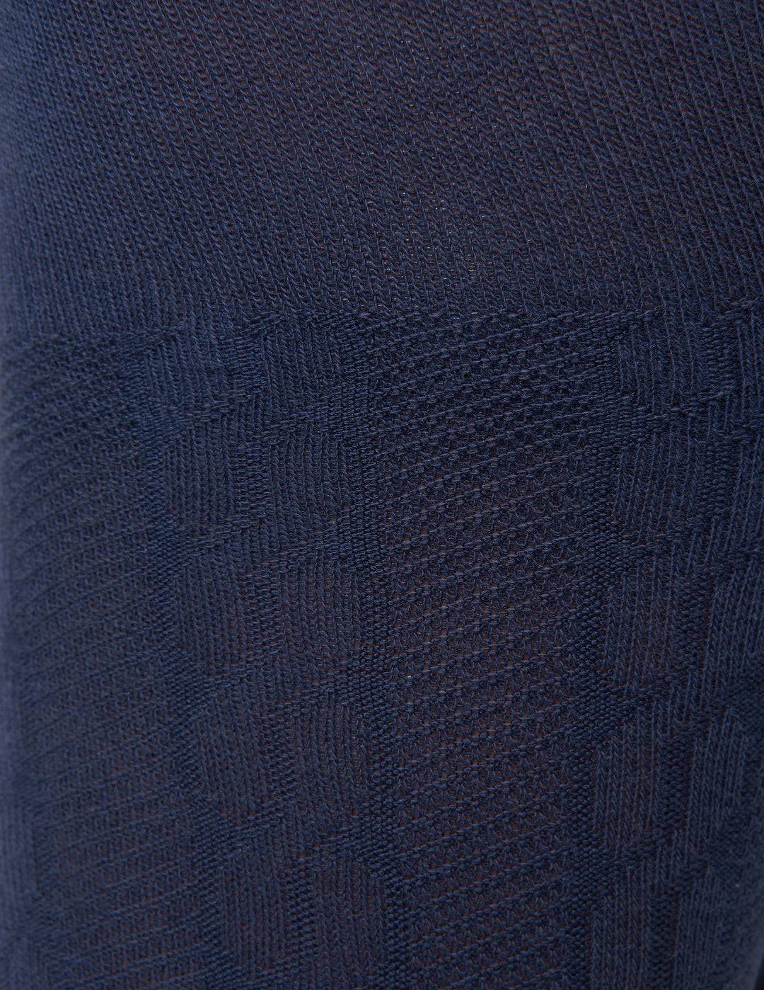Close-up of a textured navy blue fabric