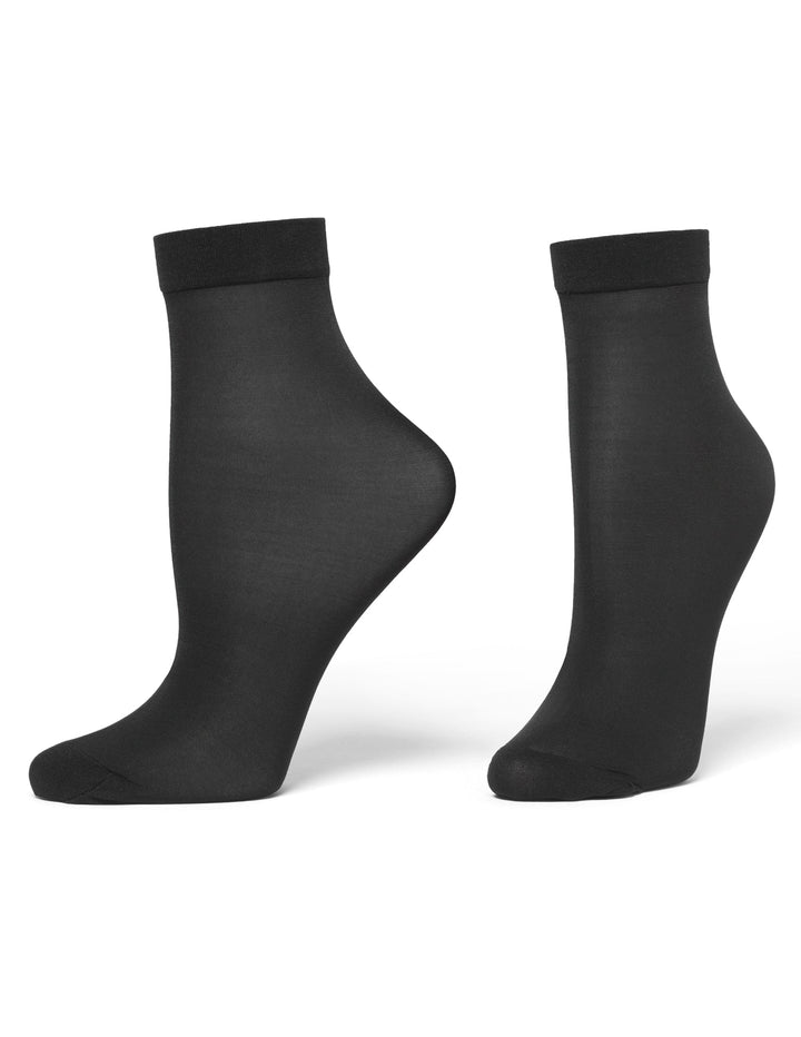 Pair of black socks on a white background
