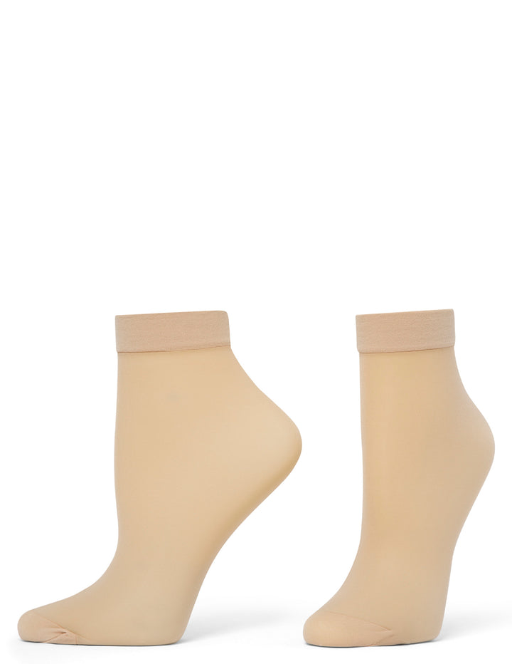 Pair of beige ankle socks on a white background