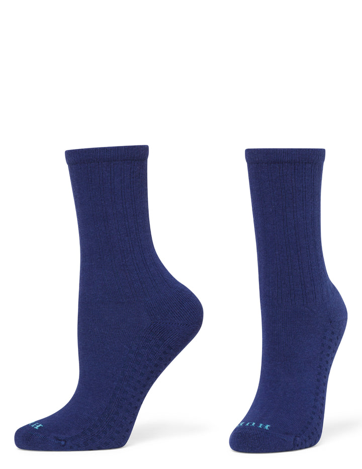 Pair of blue socks on a white background