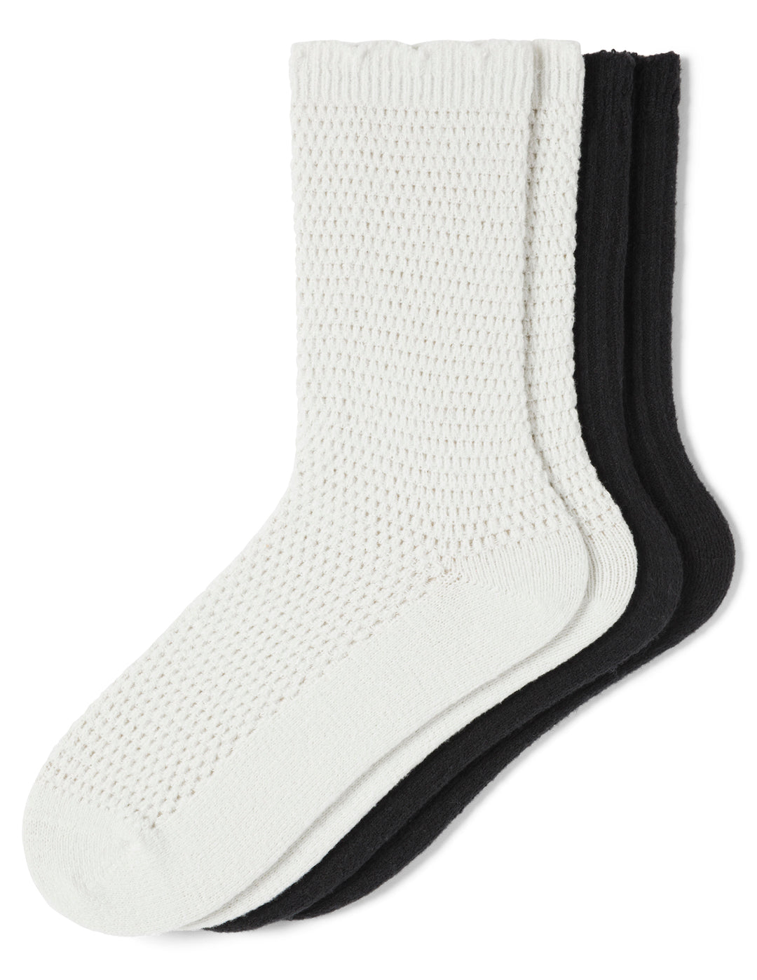 White and black textured socks on a white background