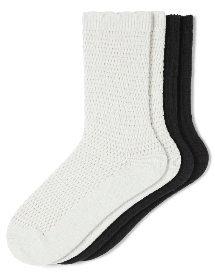 White and black textured socks on a white background