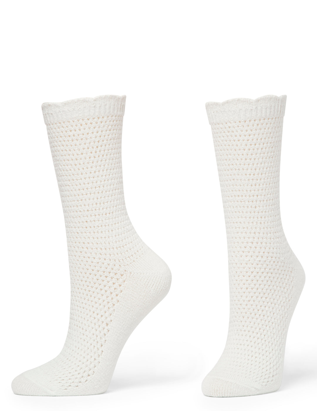 Pair of white textured socks on a white background