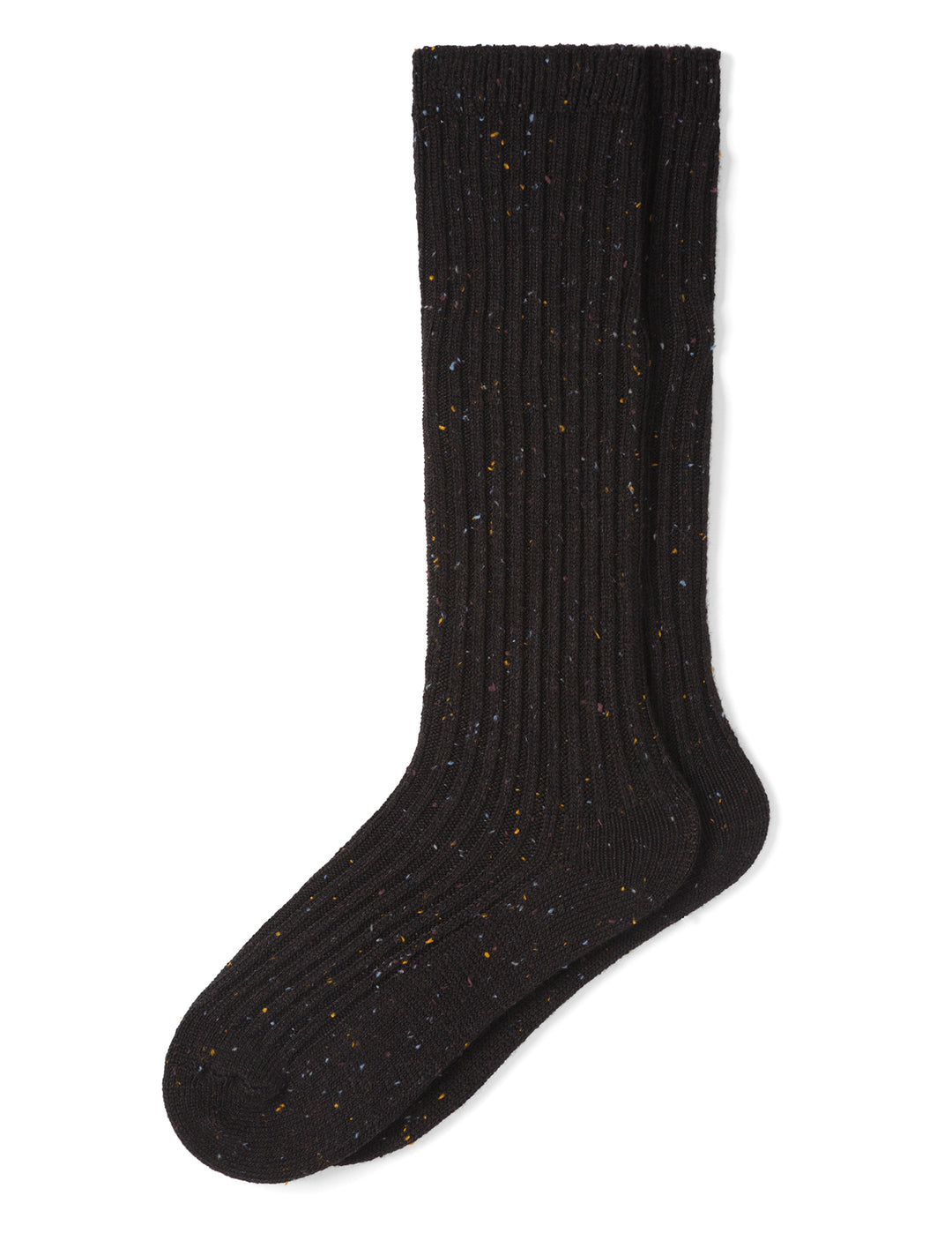 Black sock with speckled pattern on a white background