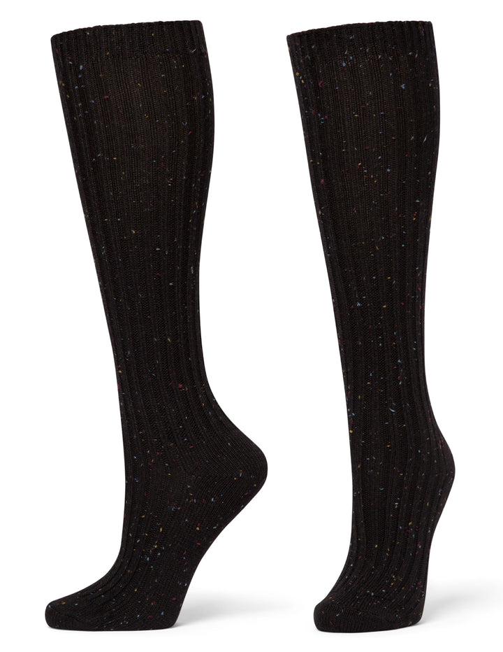 Pair of black knee-high socks on a white background