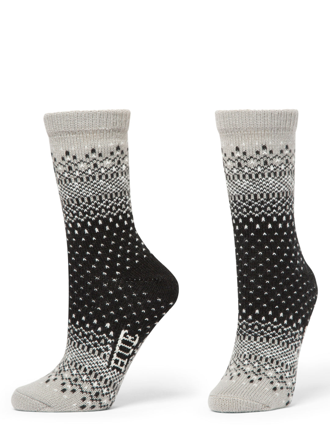 Pair of gray and black patterned socks on a white background