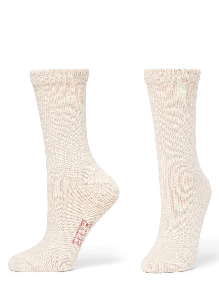 Pair of cream socks on a white background