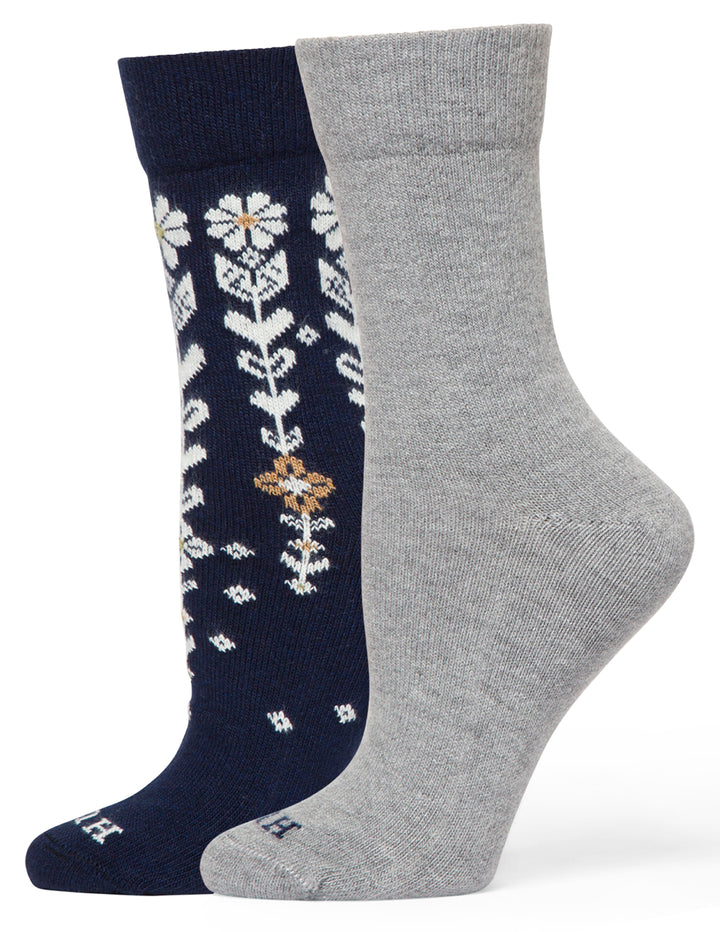 Two socks, one navy with floral pattern and one gray, on a white background