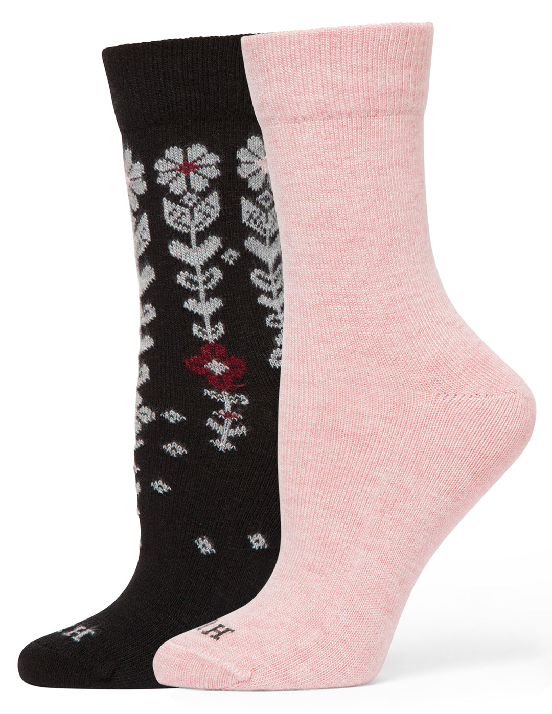 Two socks, one black with floral pattern and one pink, on a white background