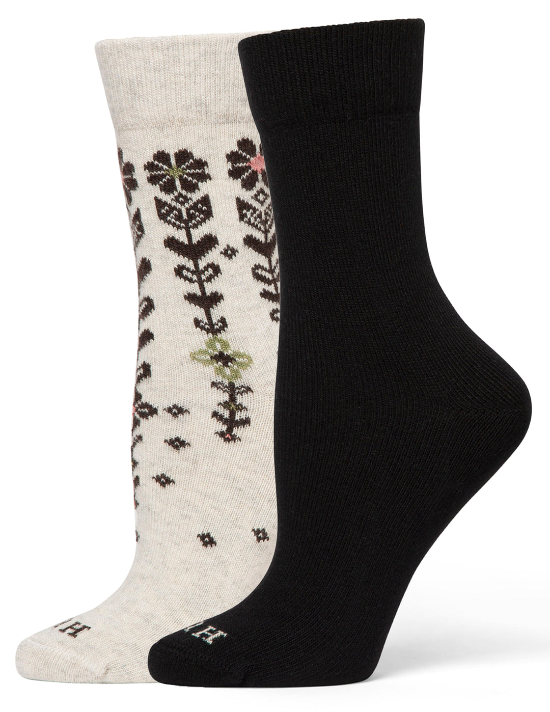 Two socks, one black and one with floral pattern on white background
