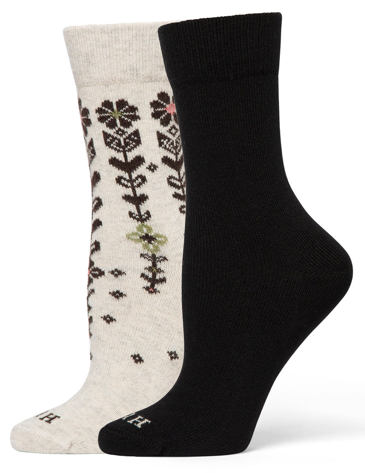 Two socks, one black and one with floral pattern on white background