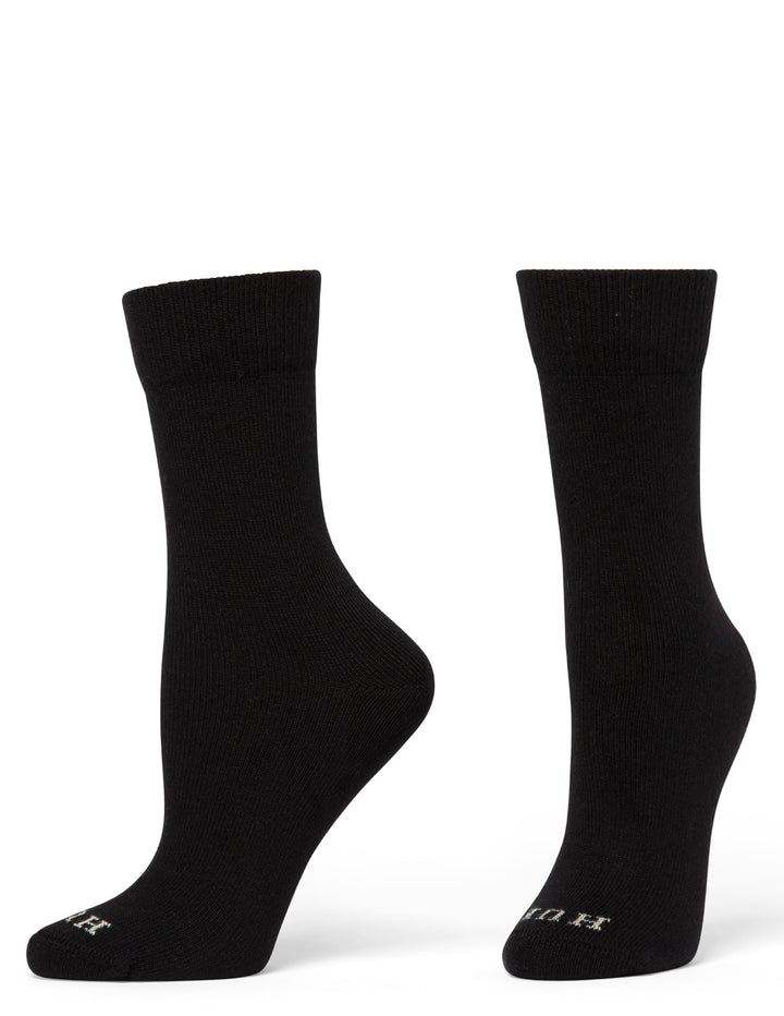 Pair of black socks on a white background