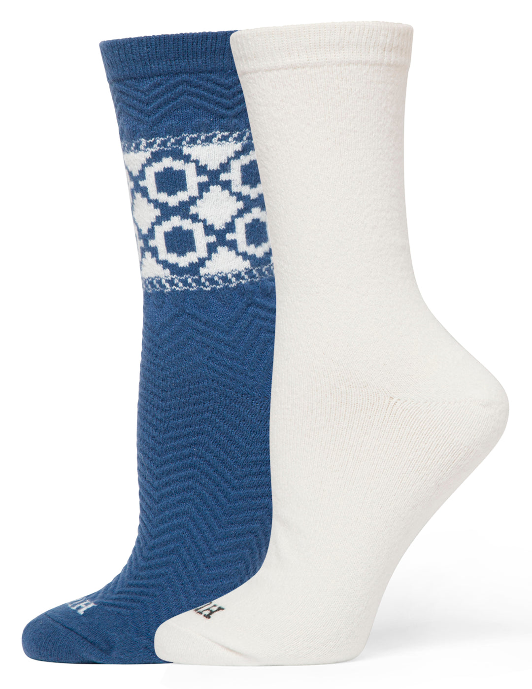 Two socks, one blue with a geometric pattern and one white, on a white background.