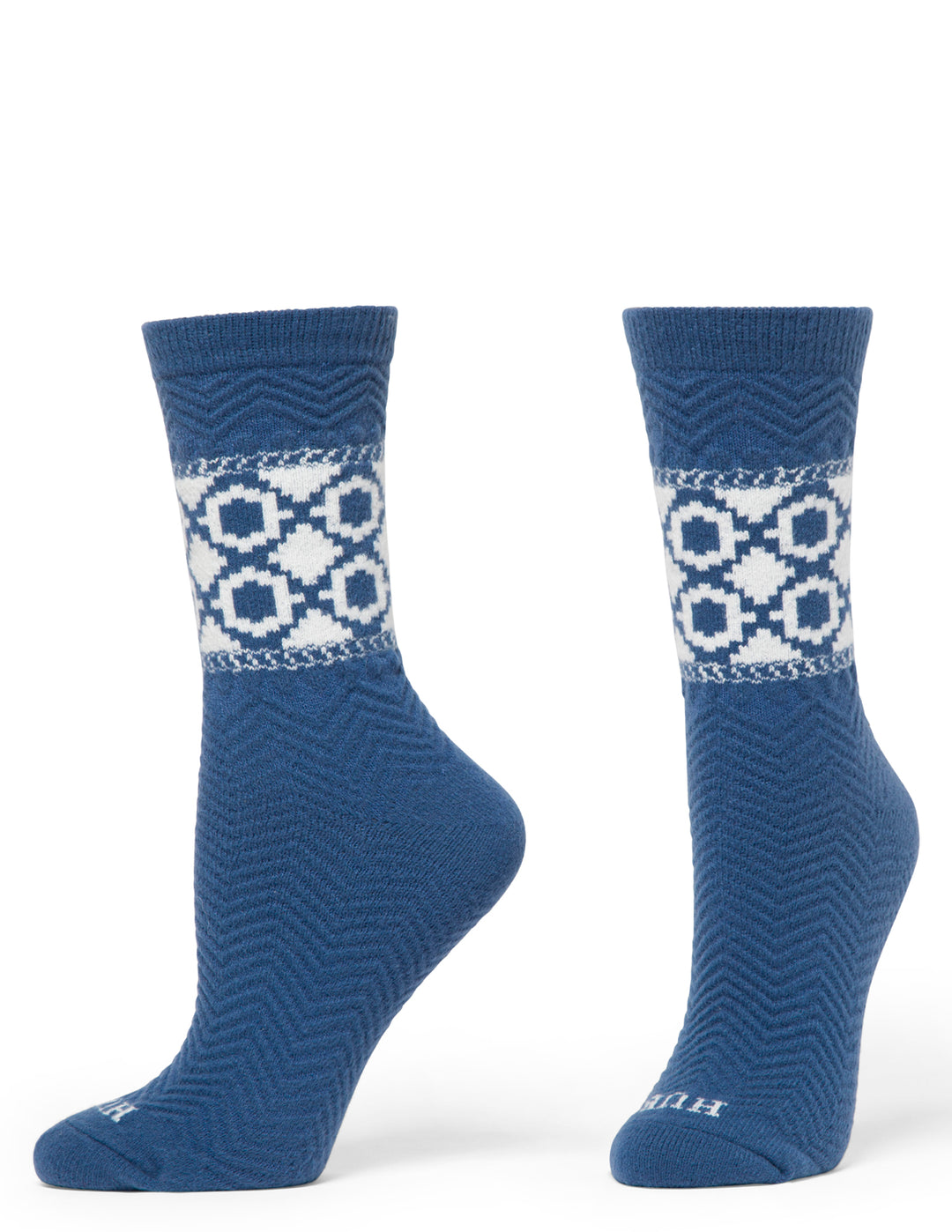 Pair of blue socks with white pattern on a white background
