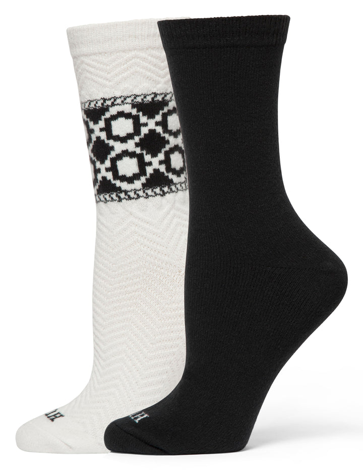 Two socks, one white with a pattern and one black, on a white background