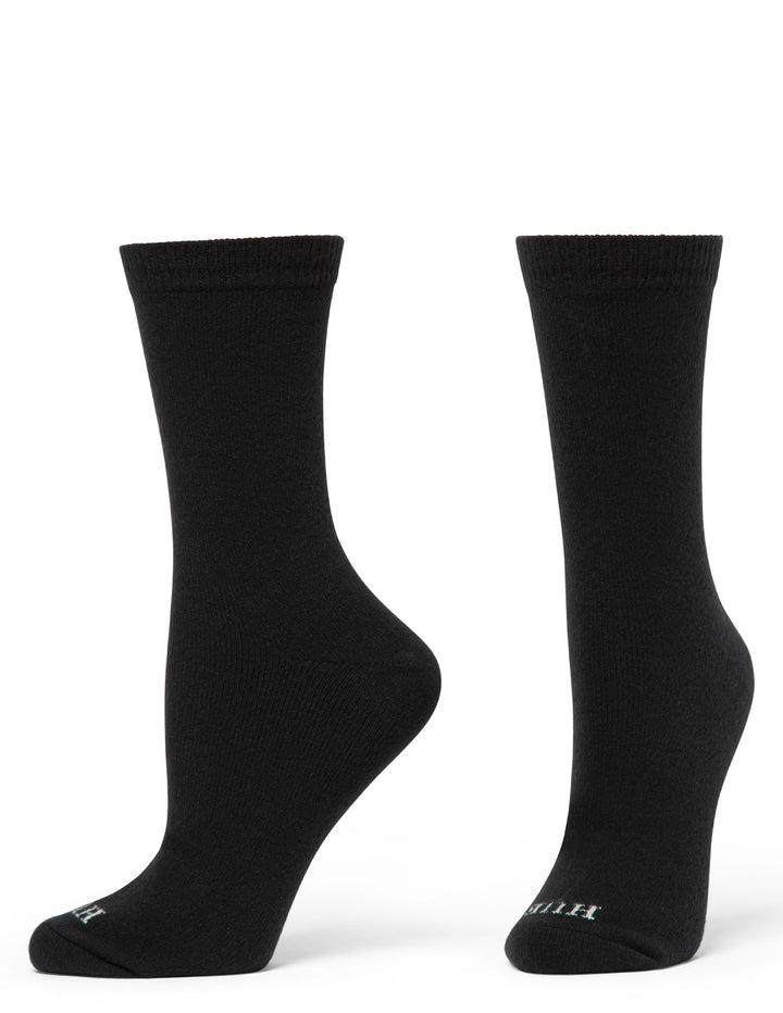 Pair of black socks on a white background