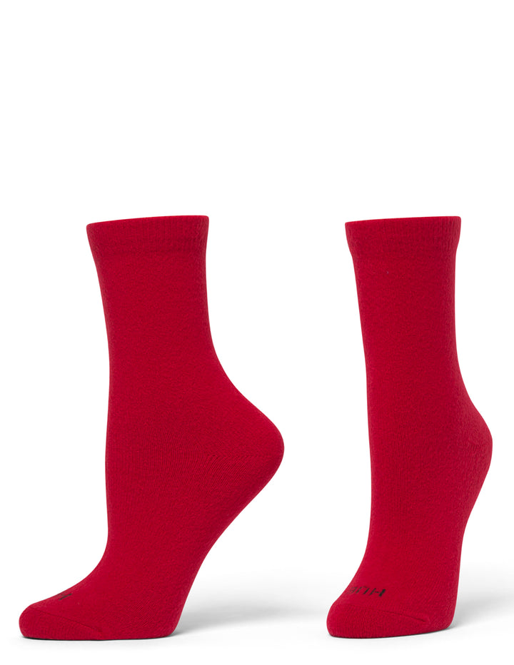Pair of red socks on a white background