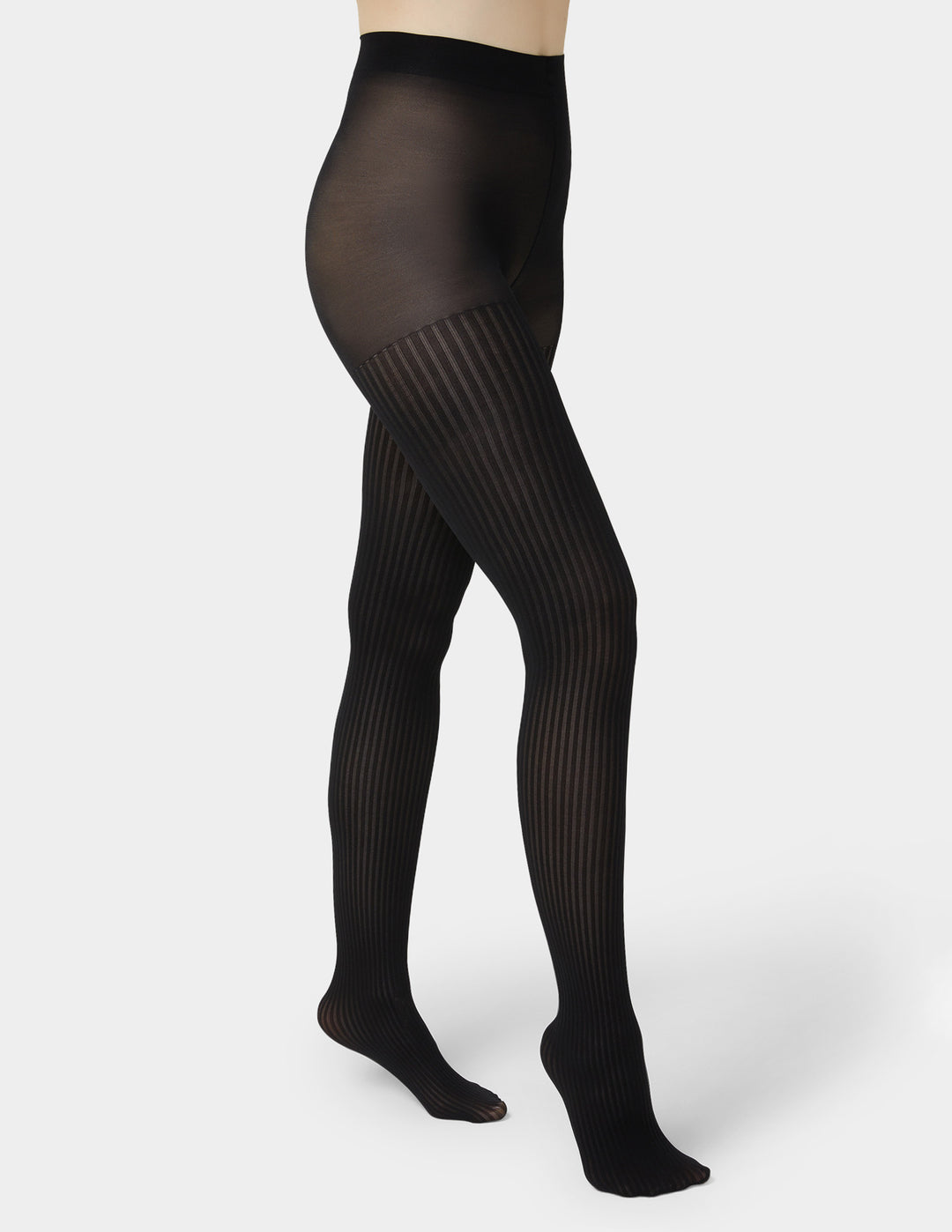 Black tights worn by a person on a white background