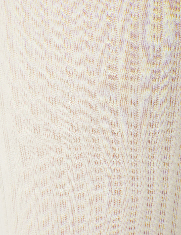 Close-up of beige fabric texture