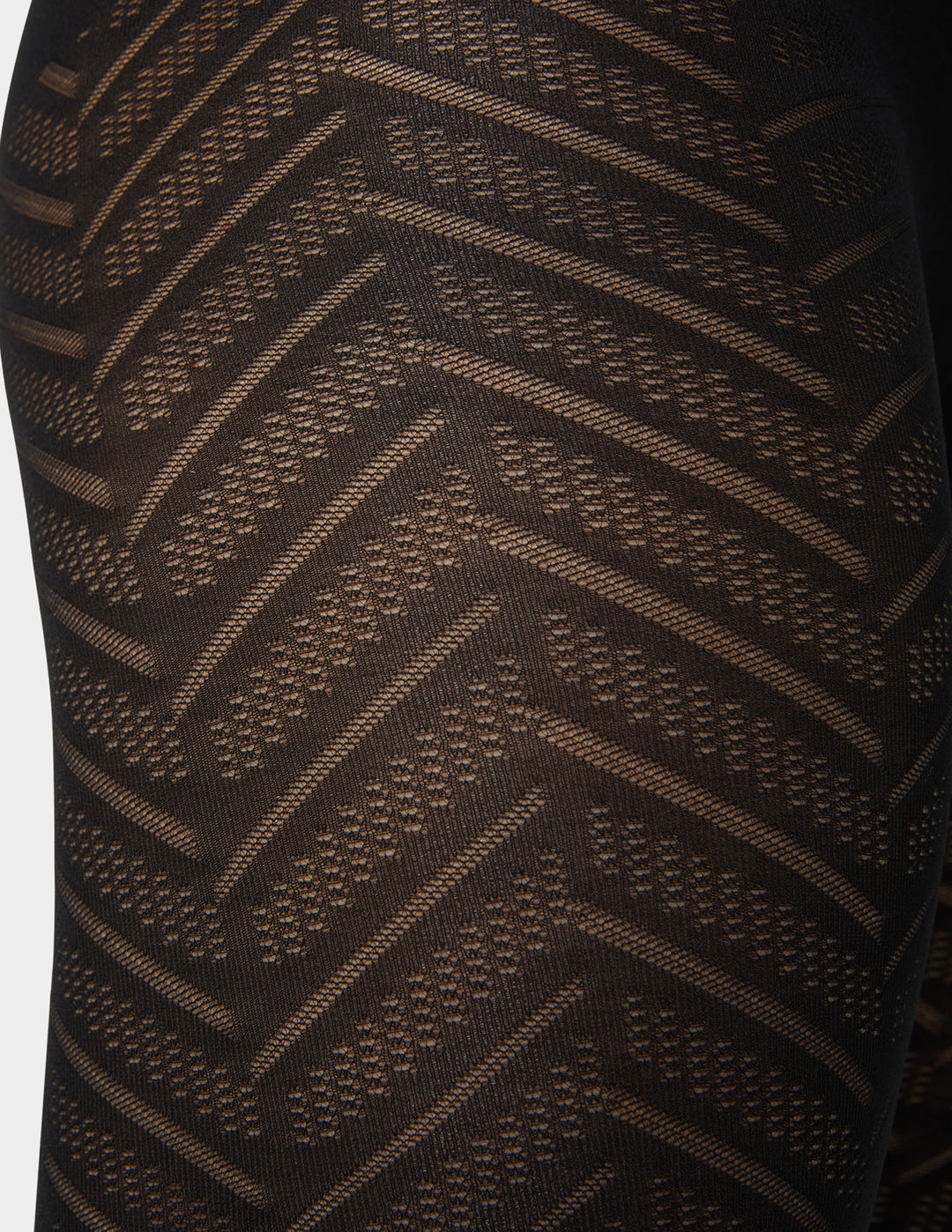 Close-up of a brown textured fabric with a geometric pattern