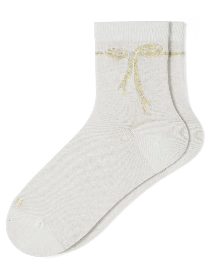White sock with a gold bow design on a white background