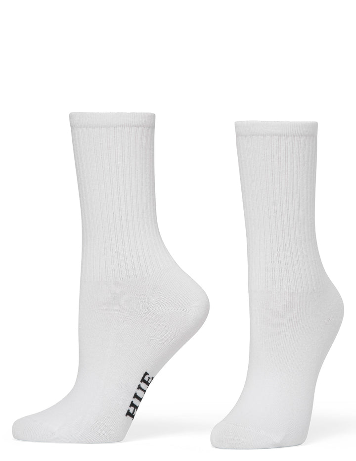 Two white socks with a brand logo on a white background