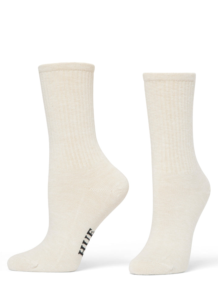 Pair of beige socks with a brand logo on a white background
