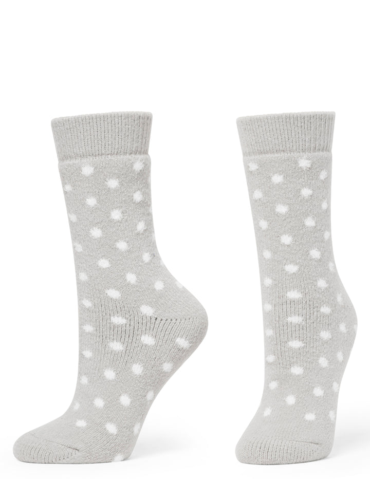 Gray socks with white polka dots on a white background