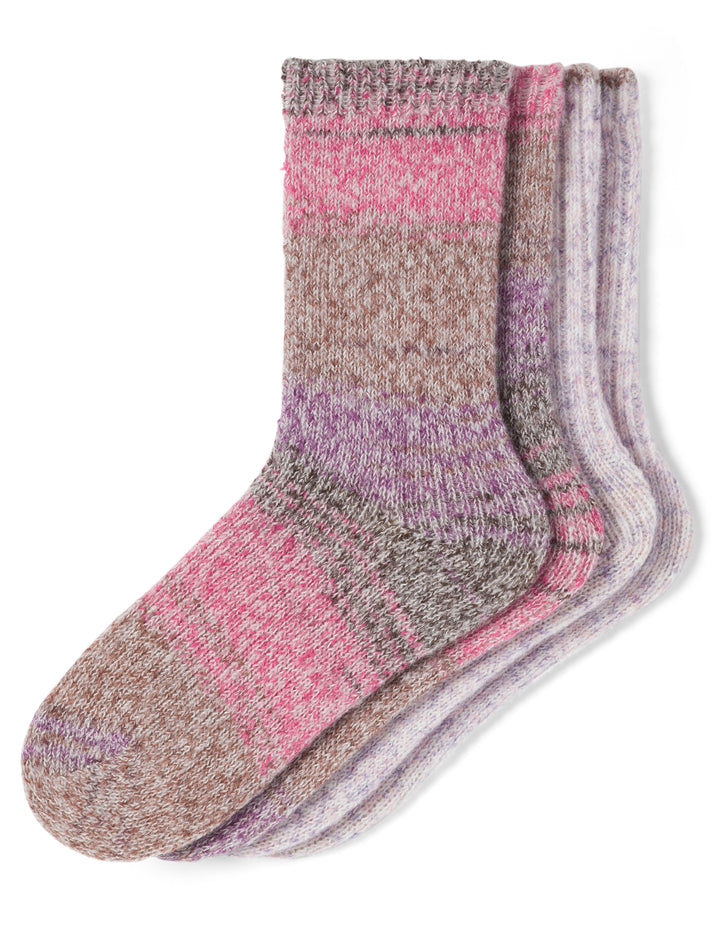 Two pairs of pink and beige socks on a white background