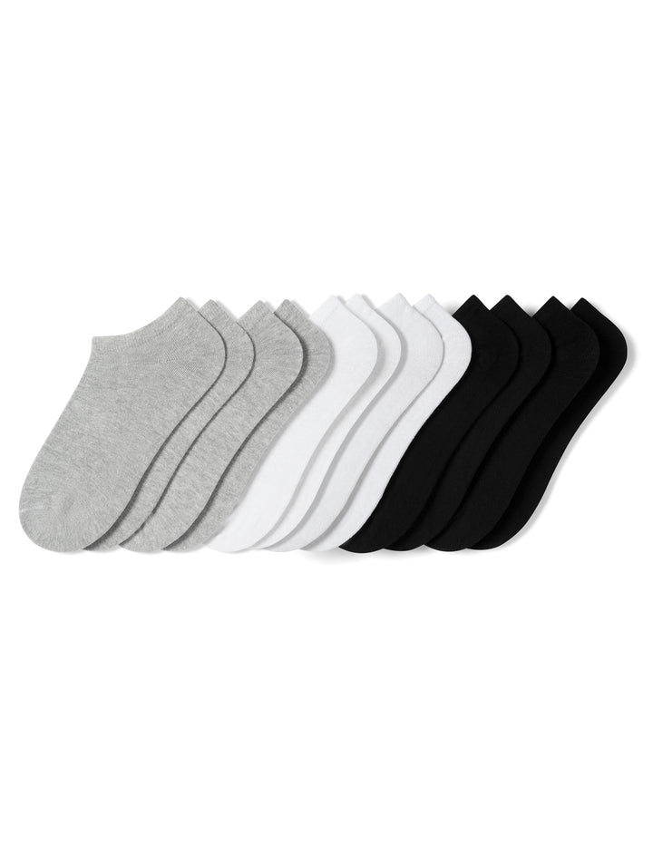 Set of six pairs of socks in gray, white, and black on a white background
