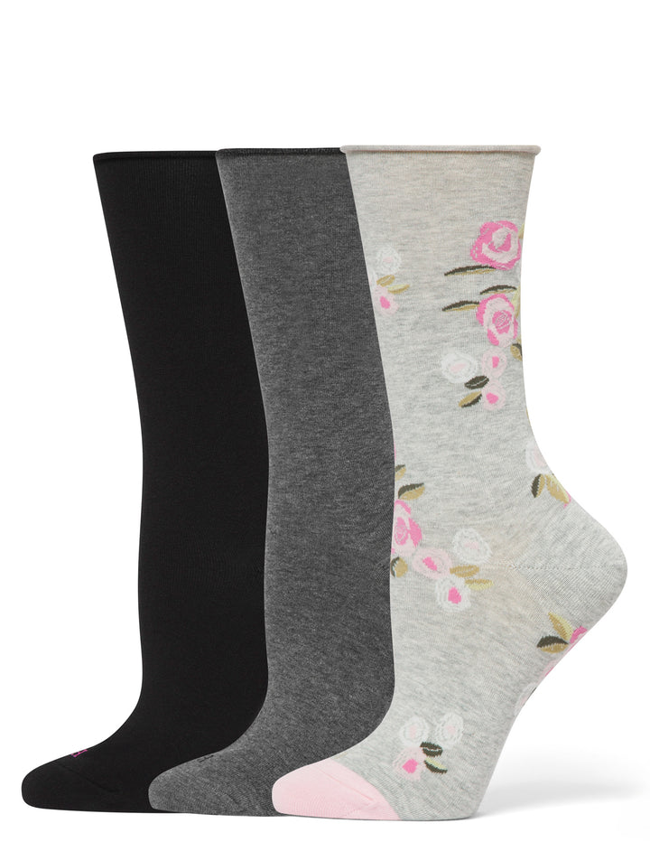 Three pairs of socks in black, gray, and floral pattern on a white background