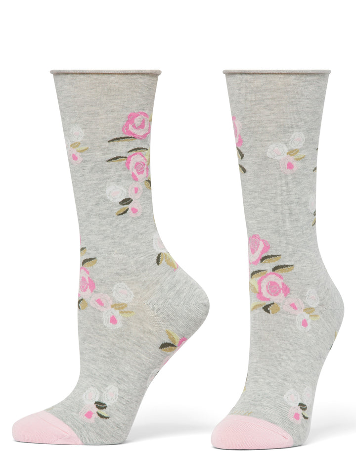 Gray socks with floral patterns on a white background